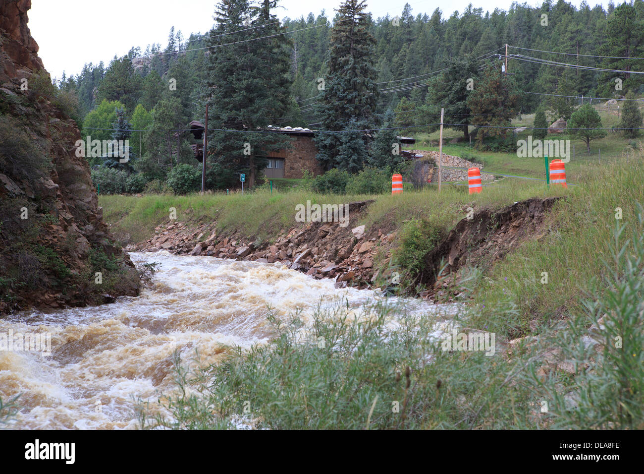 Evergreen, CO USA.  14 Sept, 2013. Portions of Highway 74 into Evergreen are in danger of being washed away due to the flood waters.  Evergreen is expected to receive more rain through Sunday. © Ed Endicott  Alamy Live News Stock Photo