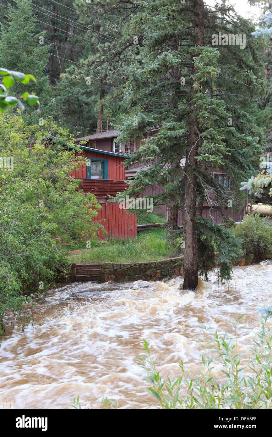 Evergreen, CO USA.  14 Sept, 2013. Houses along Highway 74 are in Danger as Bear Creek along Hwy 74 rises.  Evergreen is expected to receive more rain through Sunday. © Ed Endicott  Alamy Live News Stock Photo