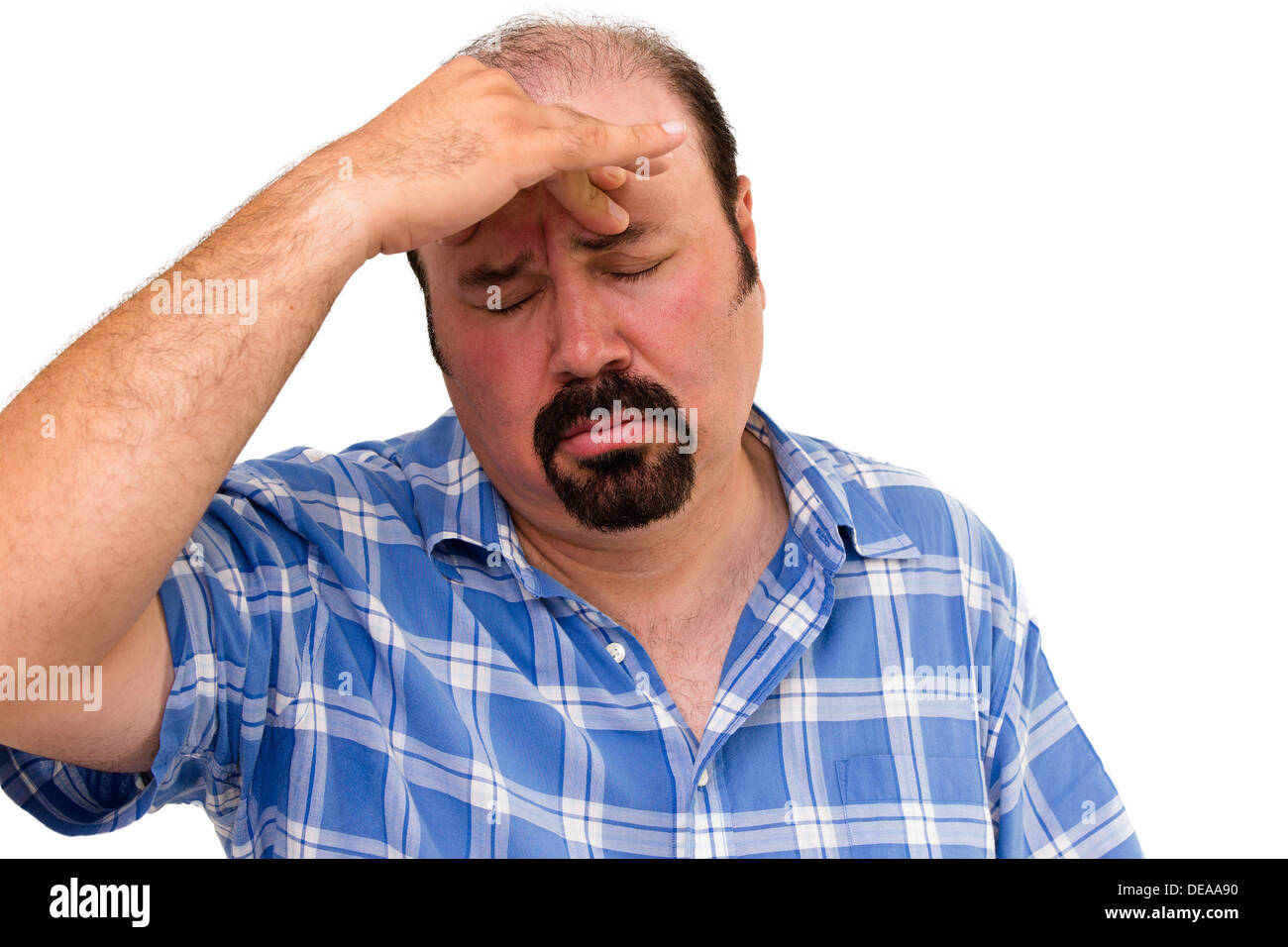Man looking worried with hand on forehead isolated on white Stock Photo
