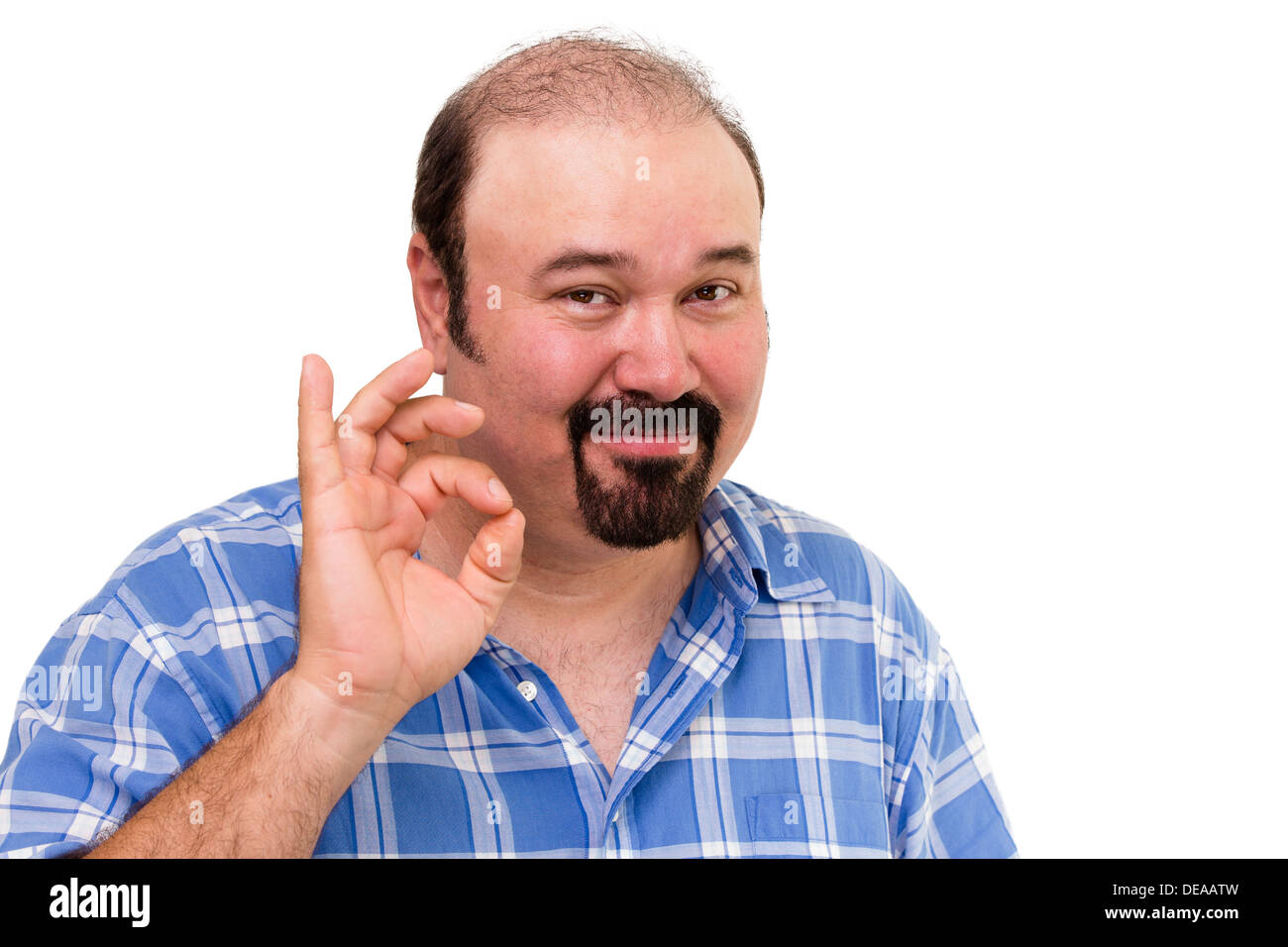 Smiling man making a Perfect gesture with his fingers to signify his approval of a superb product or job isolated on white Stock Photo