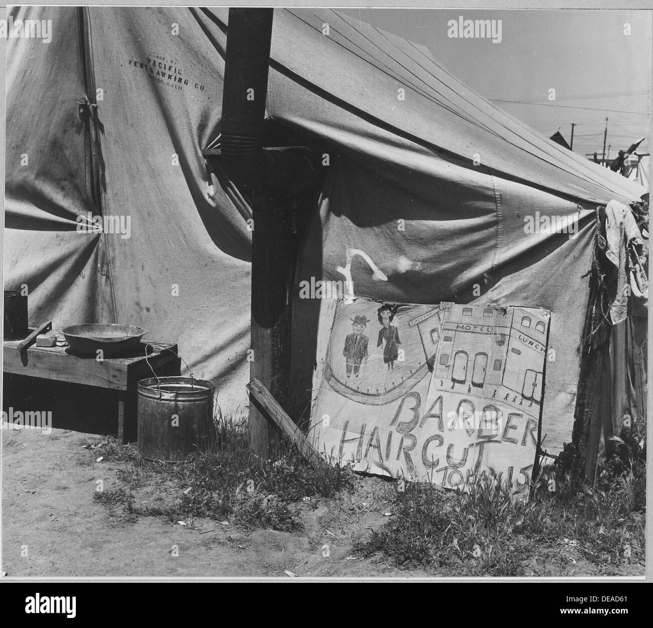 Edison, Kern County, California. Close-up of barber shop in migratory potato pickers camp. Note . . . 521785 Stock Photo