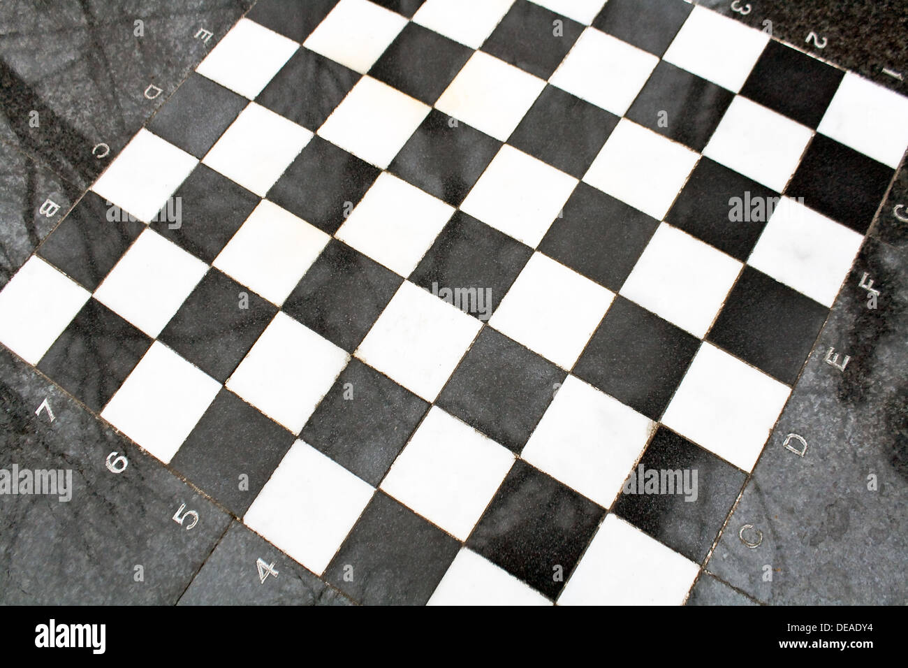 Marble Chessmen On A Chessboard Stock Photo - Download Image Now - Bishop -  Chess Piece, Black Color, Chess - iStock