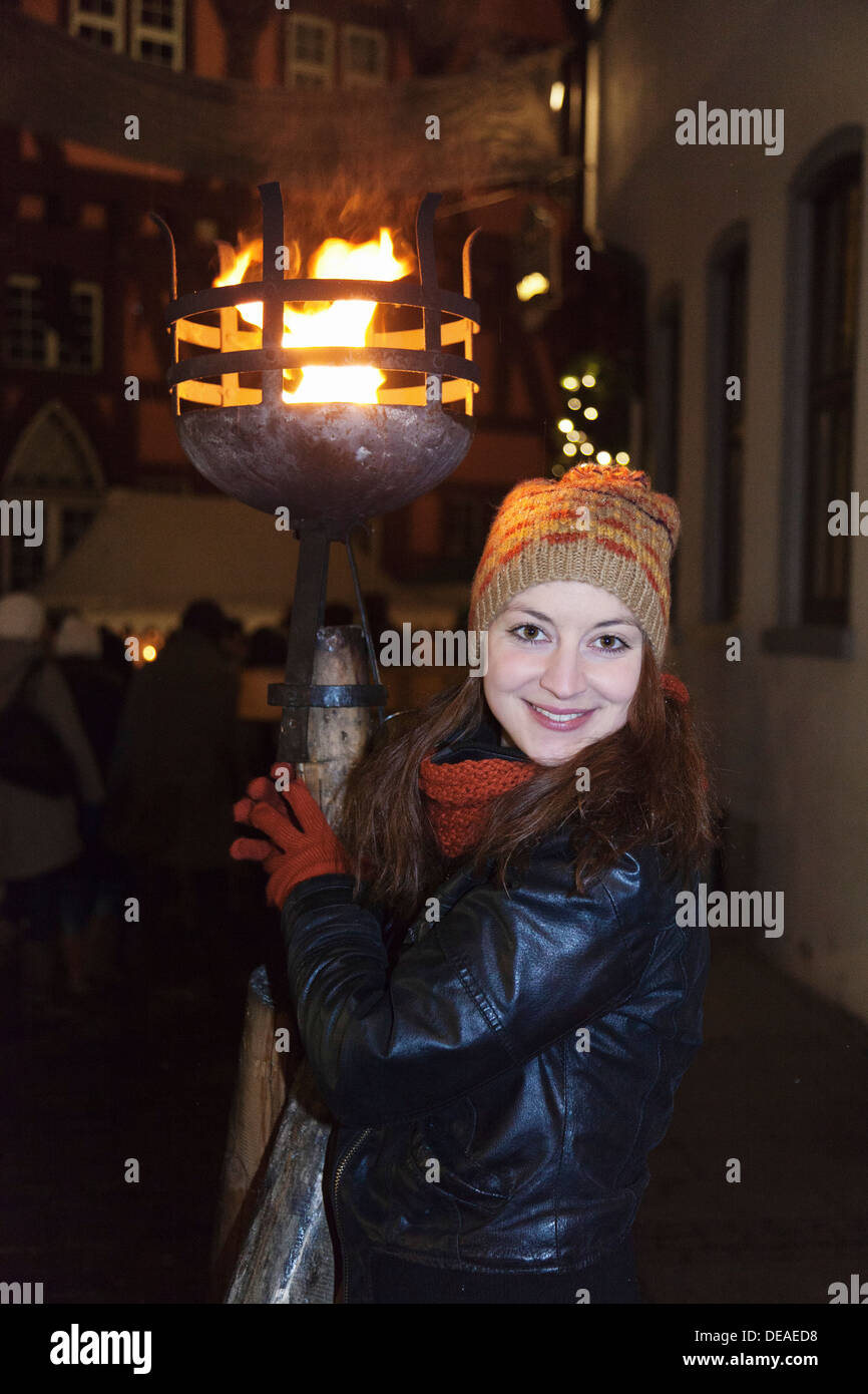 Young woman at the Medieval Market at the Christmas fair, Esslingen, Baden Wurttemberg, Germany Stock Photo