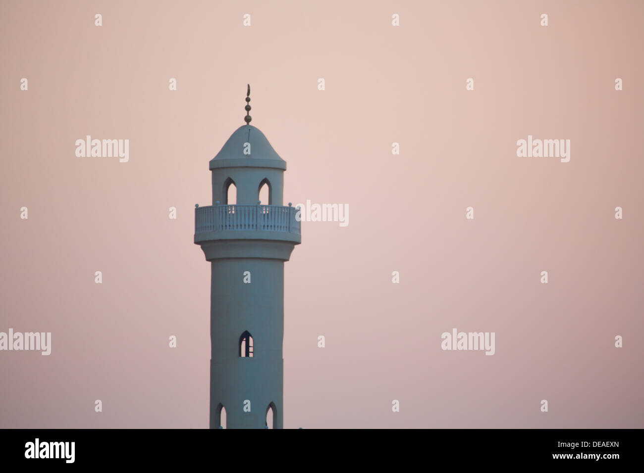 Minaret against an early dusk sky in Doha, Qatar. Stock Photo