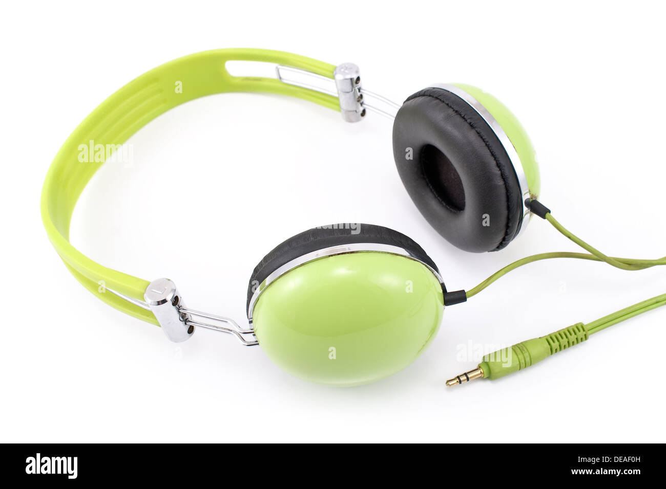Green headphones isolated on white background Stock Photo