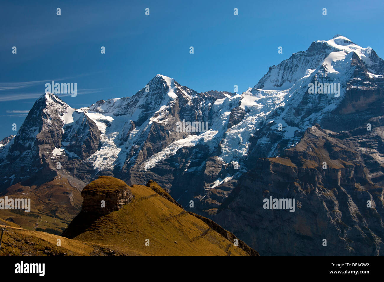 Peaks of the mountains Eiger, Moench and Jungfrau, from left, Bernese ...