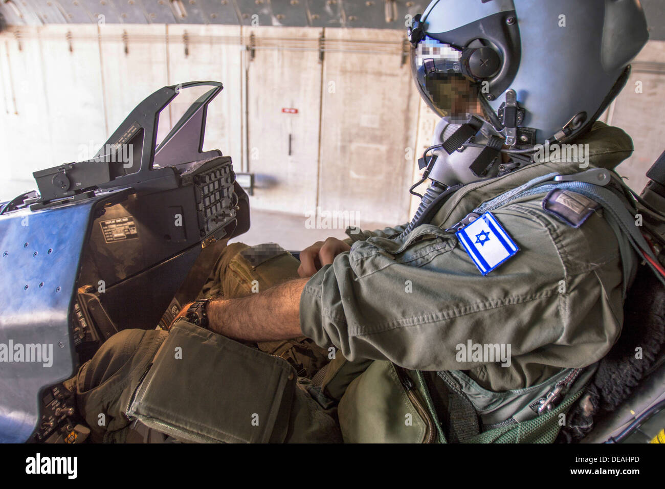 Israeli Air Force (IAF) F-16I pilot in his cockpit. Face distorted to avoid recognition Stock Photo