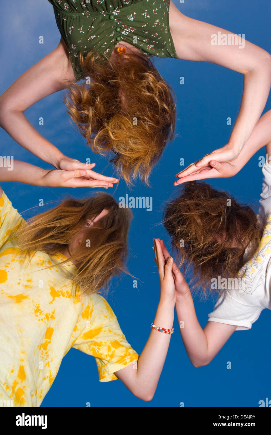 Trio, mother, 41 years, with two daughters, 17 and 14 years Stock Photo