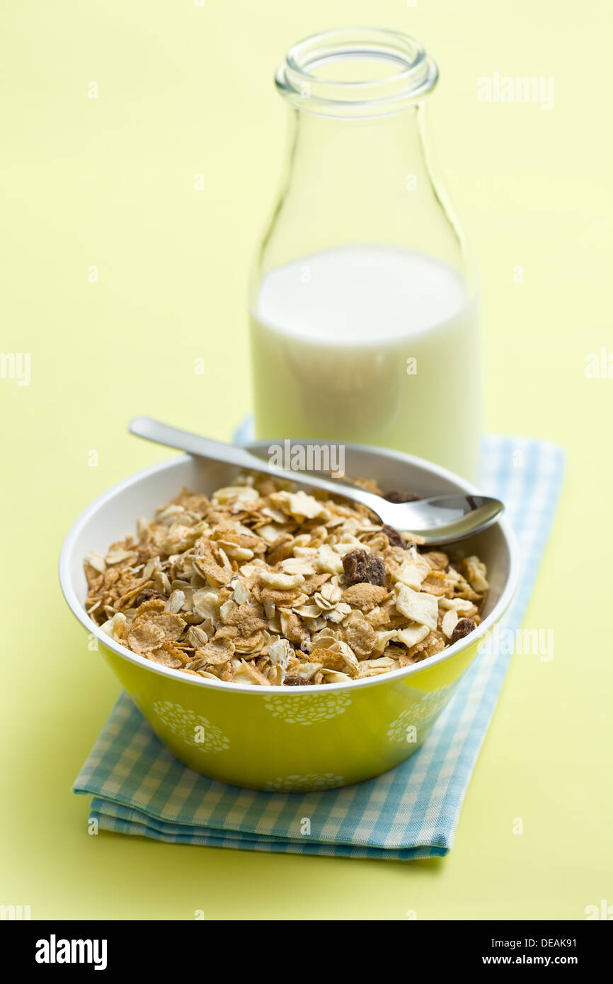 muesli in ceramic bowl and milk on colorful background Stock Photo Alamy