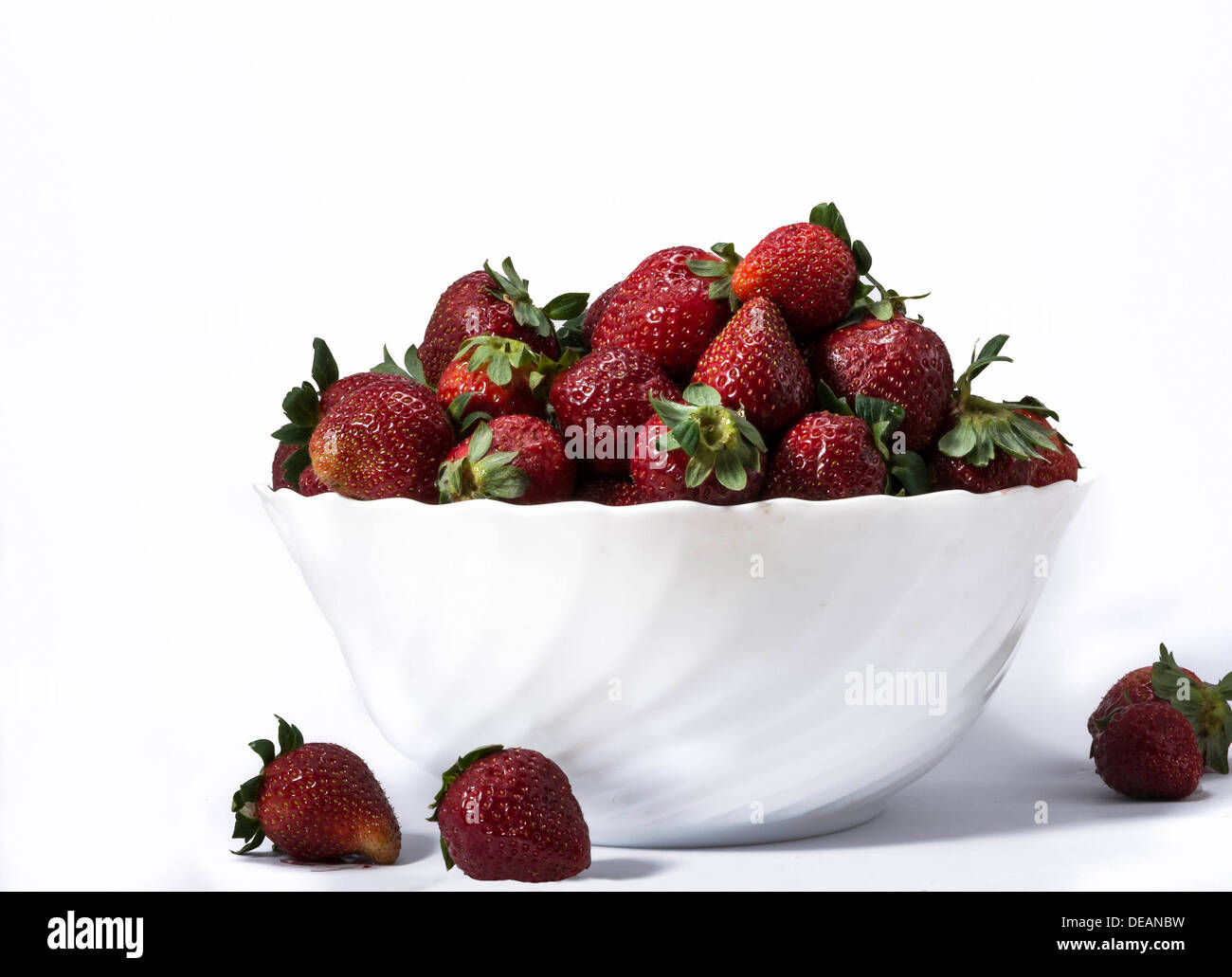 Bowl of red strawberries. Isolated image Stock Photo