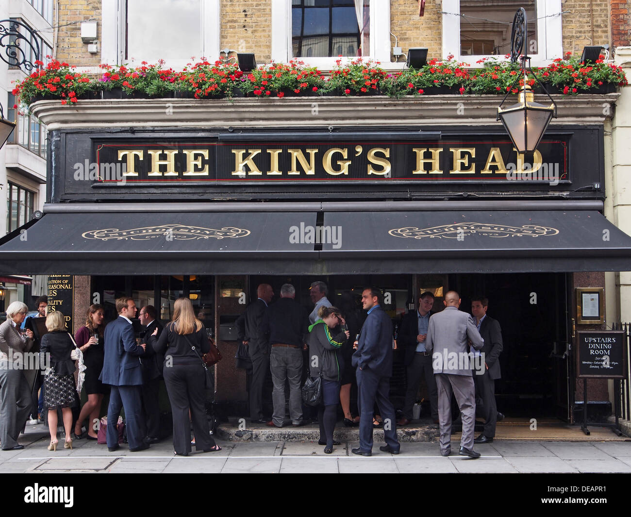 London Pub, crowd outside on a warm summer evening Stock Photo
