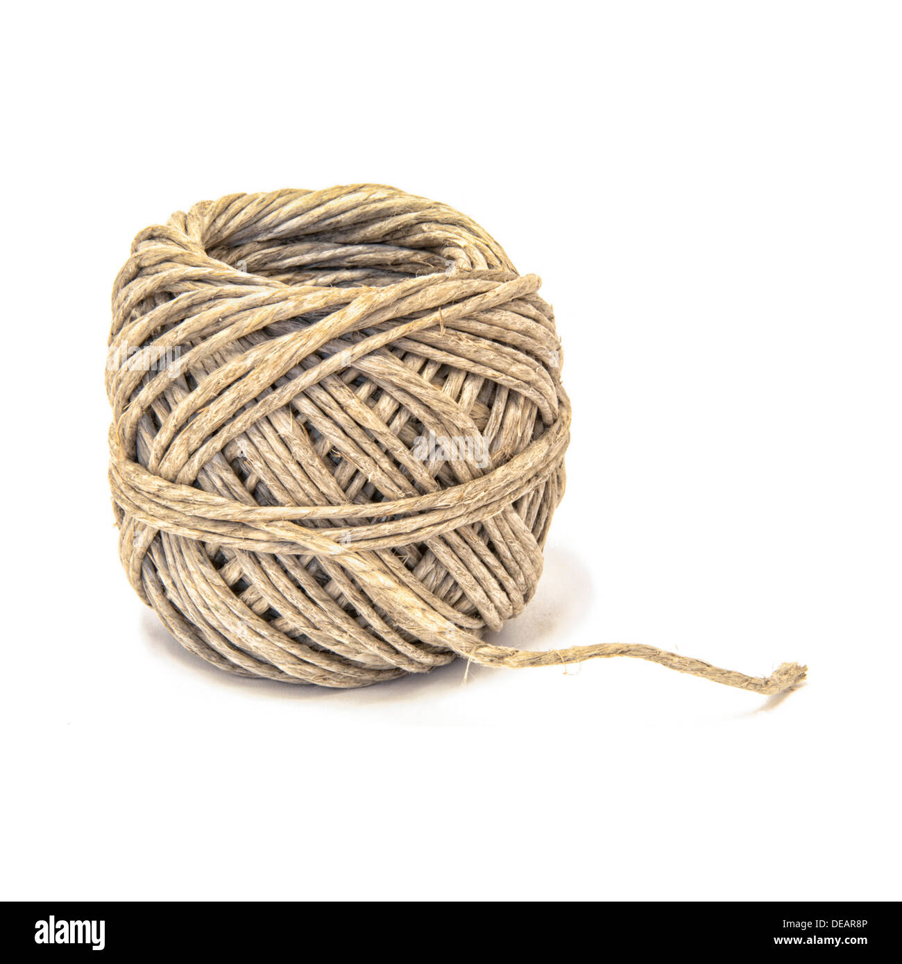 Bundle of round brown thin hemp rope with fiber texture isolated on a white  background.Twine