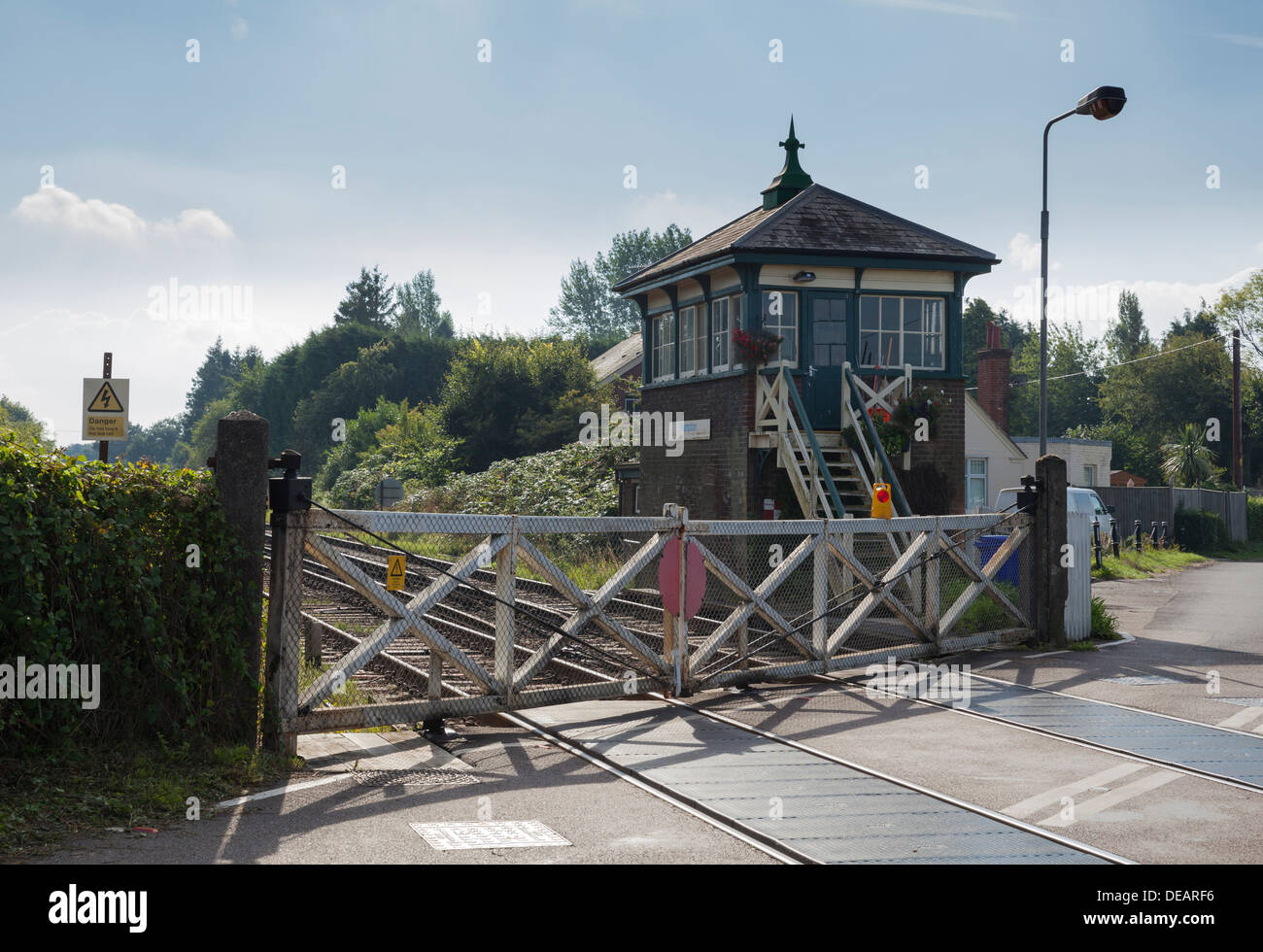 The manually operated level crossing at Plumpton railway station in East Sussex Stock Photo