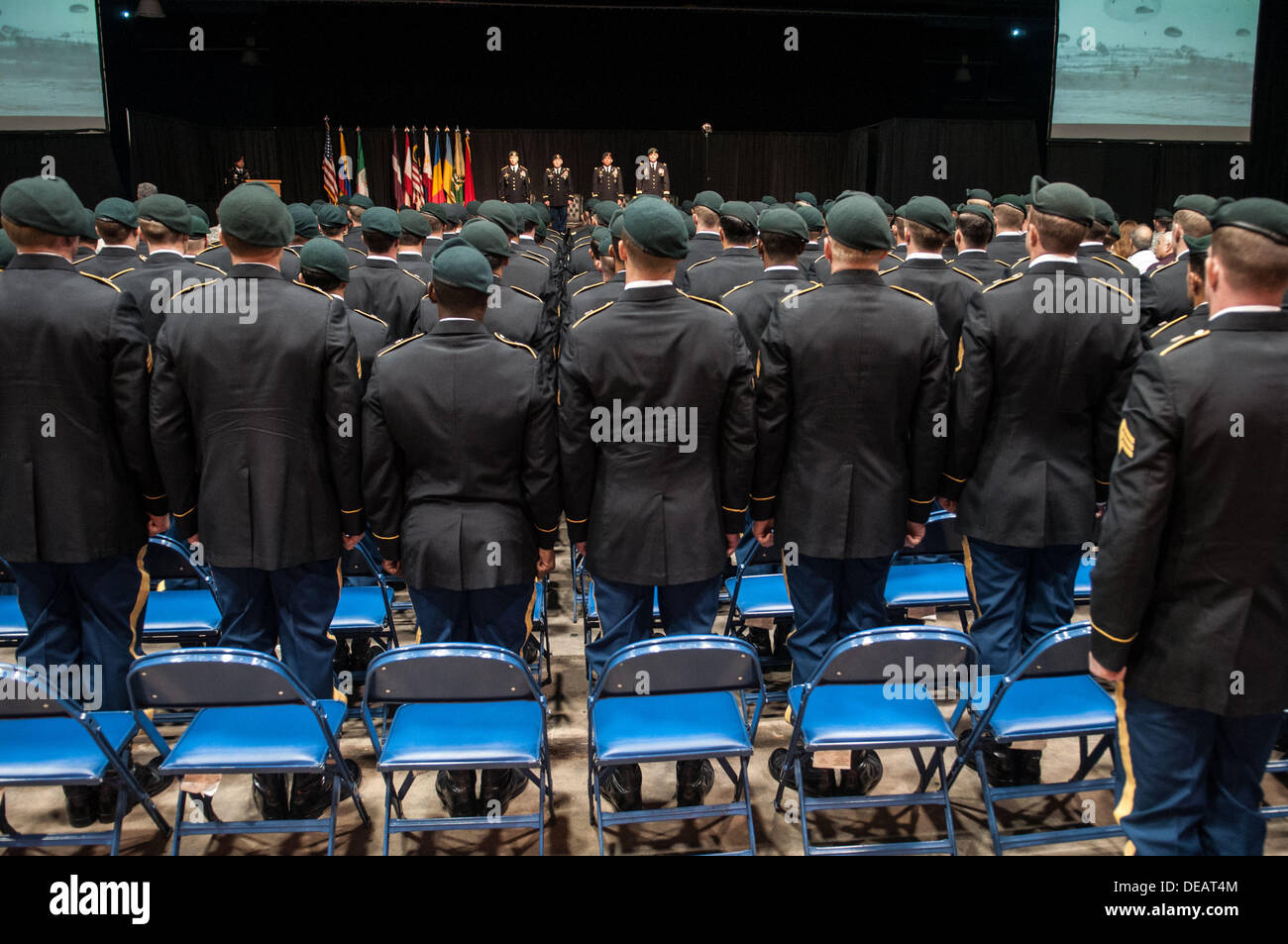 August 1, 2013 - Raleigh, North Carolina, U.S. - U.S. Army Green Beret soldiers wear their green berets for the first time at the Cumberland County Coliseum in Fayetteville, N.C. during the U.S. Army Special Forces Qualification Course graduation ceremony, Aug. 1, 2013. The soldiers of Class 277 endured nearly two years of intense training to become members of the Army's elite unconventional warfare force who will operate on operational detachment teams around the world. (Credit Image: © Timothy L. Hale/ZUMAPRESS.com) Stock Photo