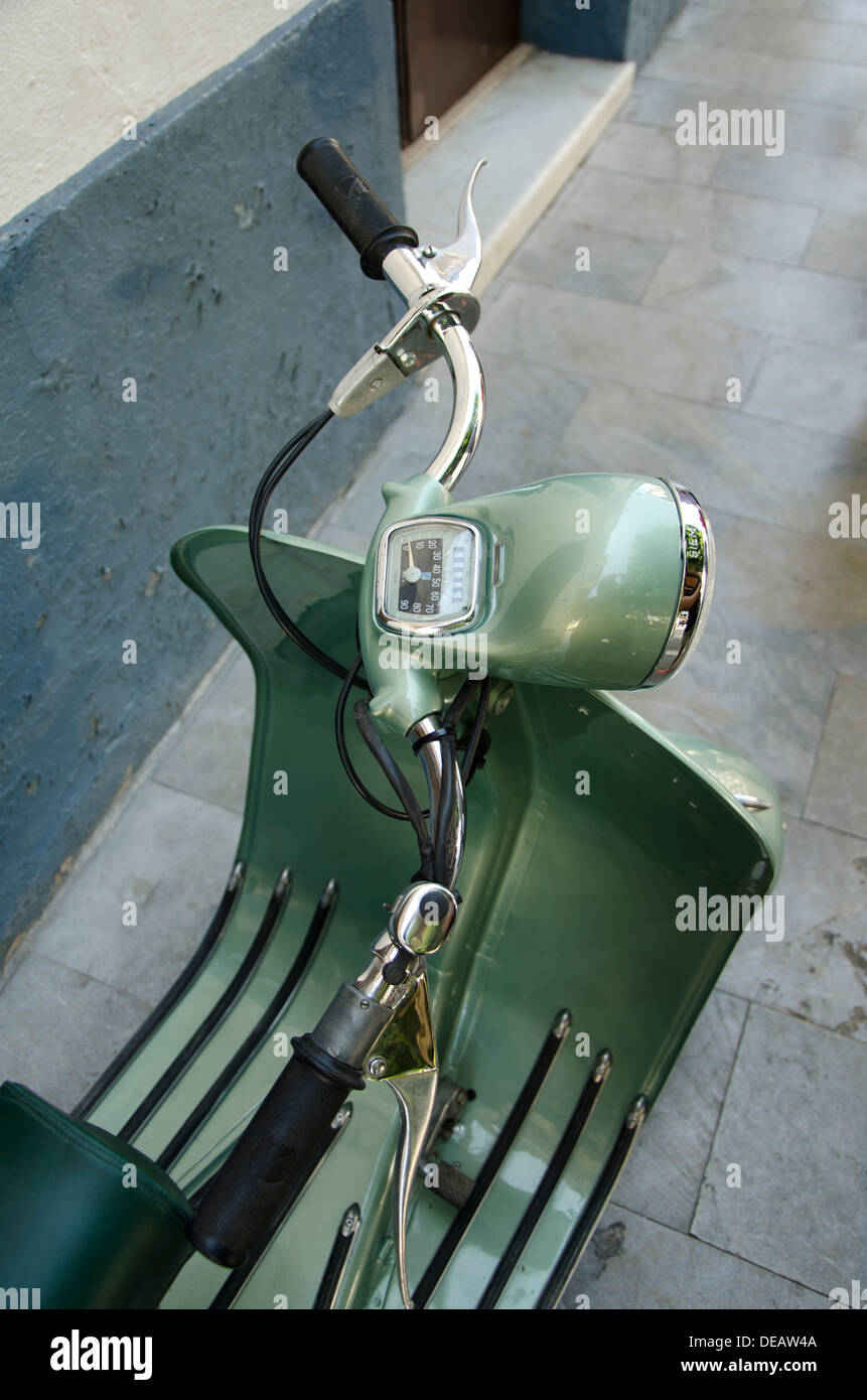 Handlebars of a Vespa Piaggio 150 classic scooter 1962 parked in a street in Spain Stock Photo