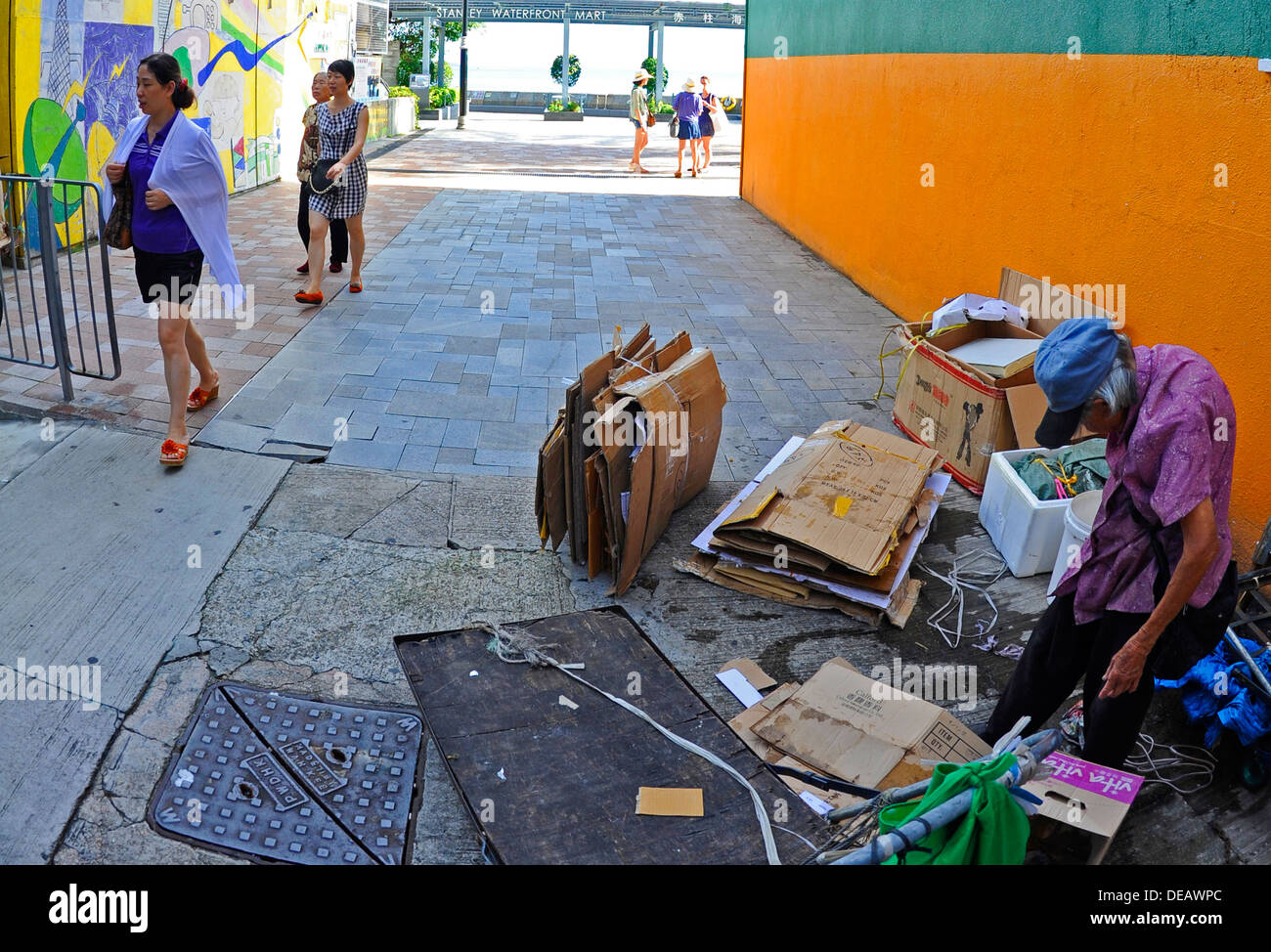 Old women collecting cardboard boxes Stock Photo - Alamy