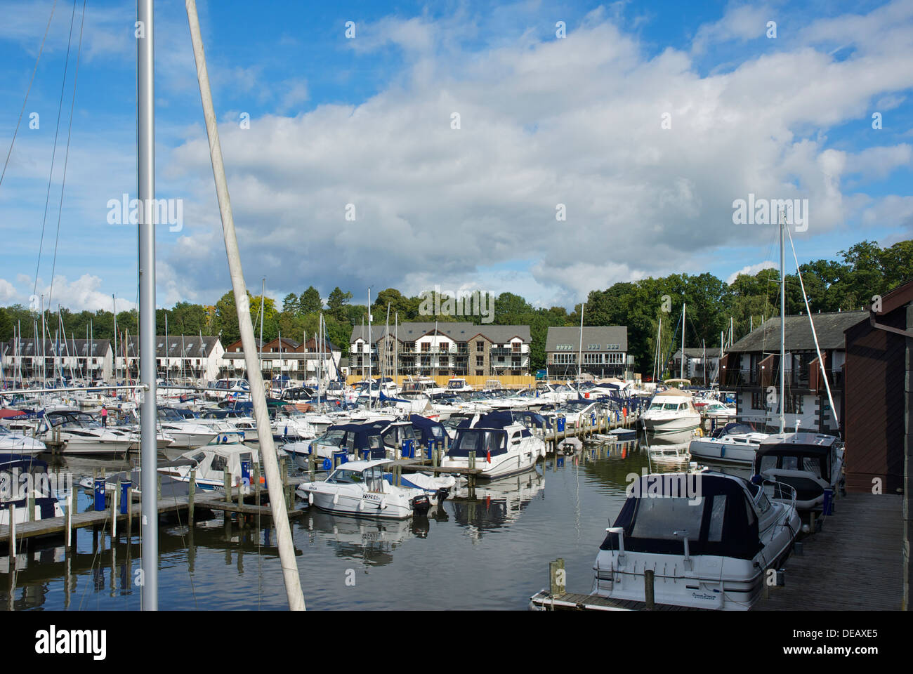 Boats moored in Windermere Marina Village, Lake Windermere, near Bowness, Cumbria, England UK Stock Photo