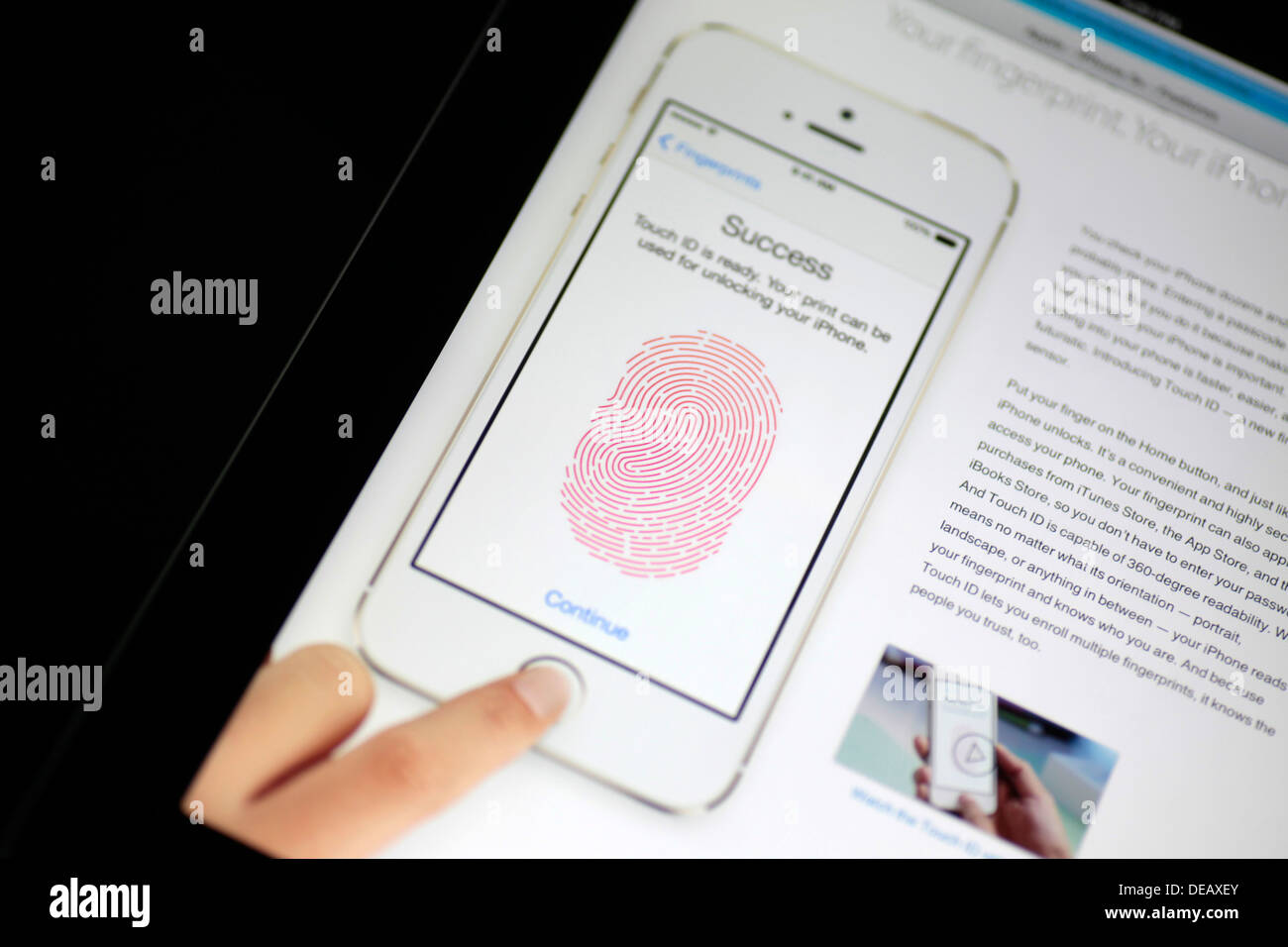 iPhone 5s web-page displayed in an Apple iPad Stock Photo