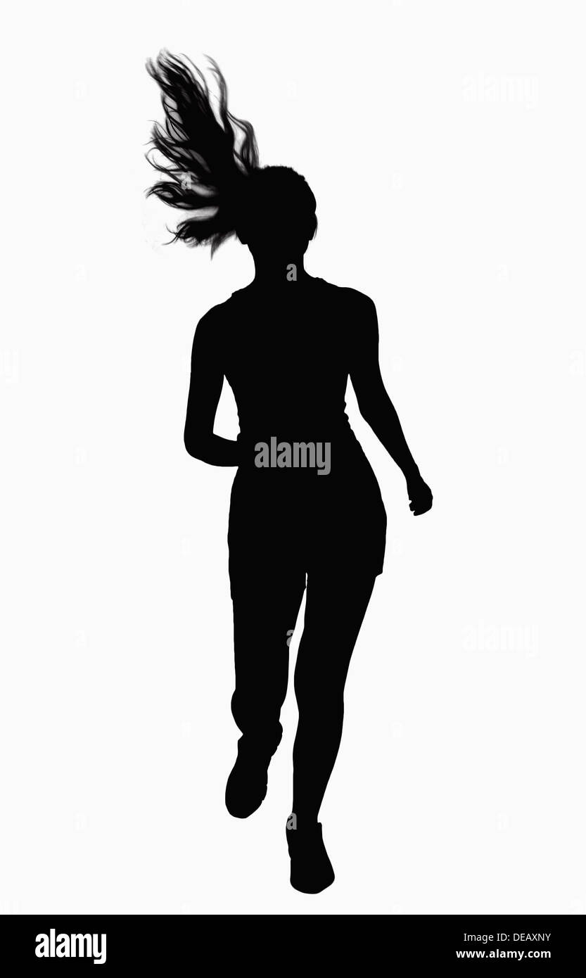 Silhouette of woman running. Stock Photo