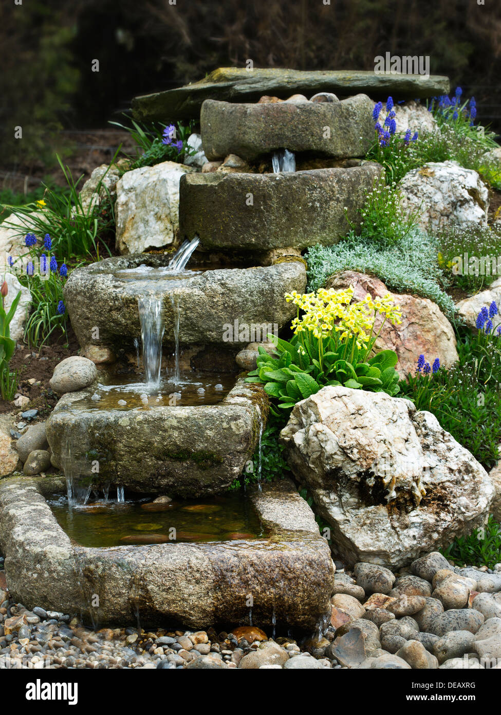 Stone water trough water feature hires stock photography and images