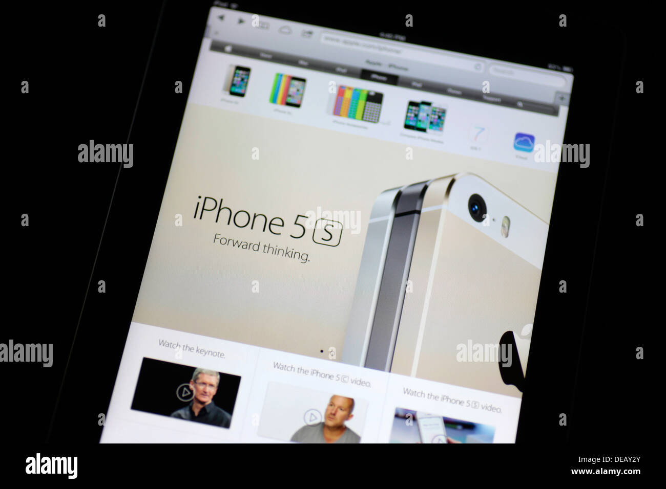 iPhone 5s web-page displayed in an Apple iPad Stock Photo