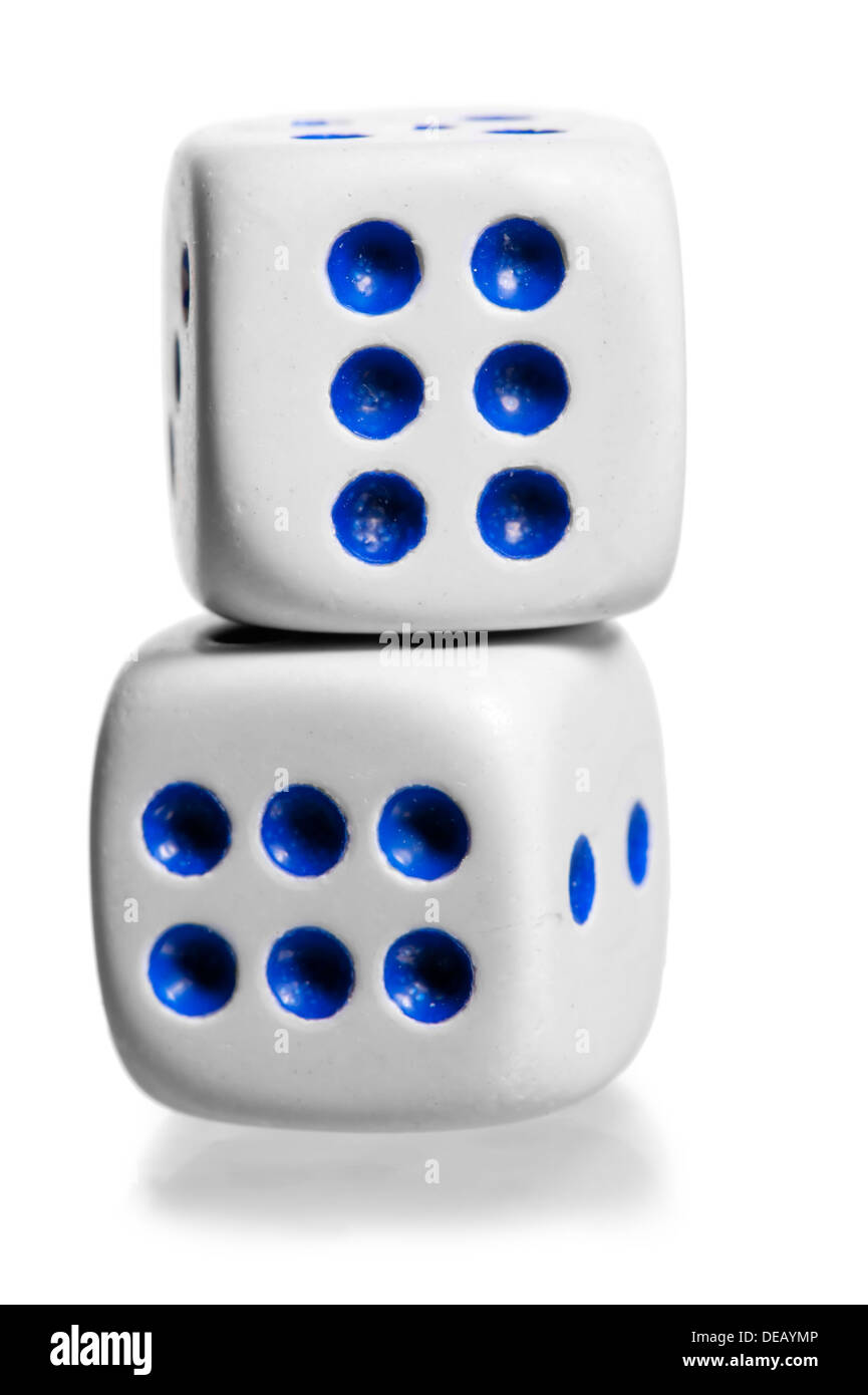 two white dice stand by each other on a white background Stock Photo