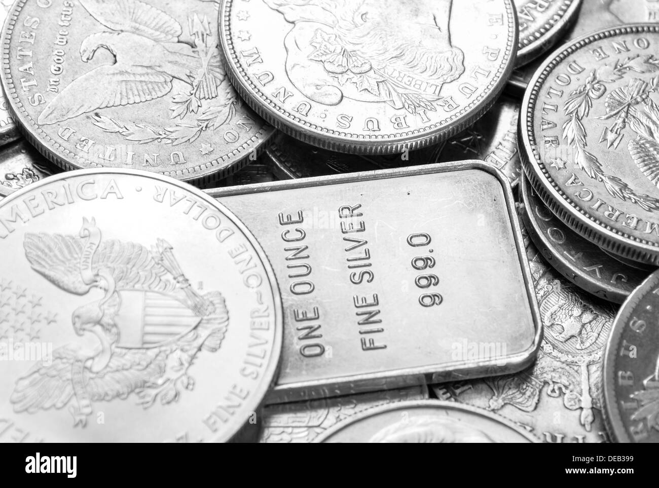 Silver coins and bars macro shot Stock Photo