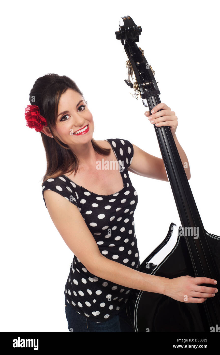 Smiling Rockabilly Girl Playing a Stand-Up Bass Stock Photo