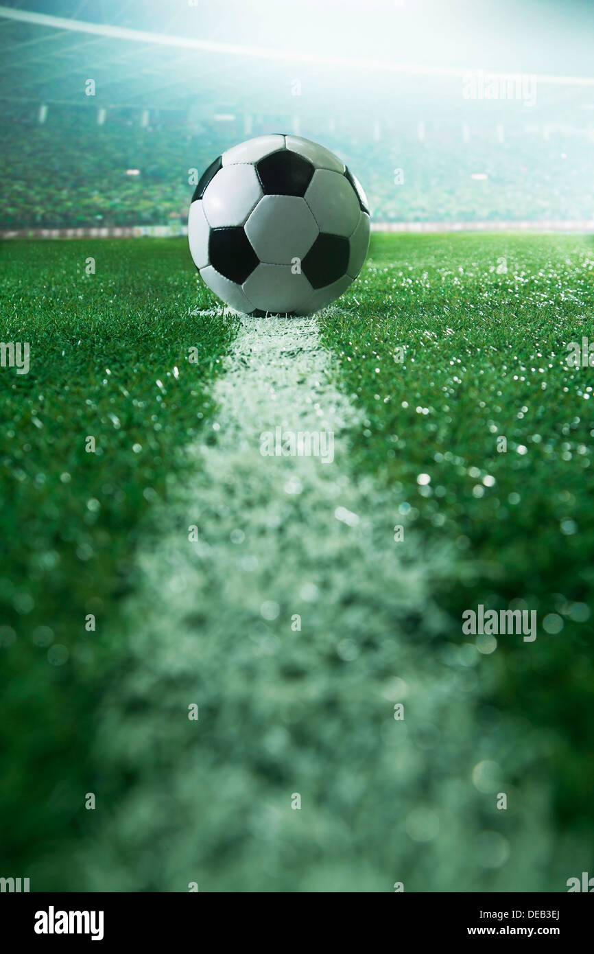 Soccer field with soccer ball and line, side view Stock Photo Alamy