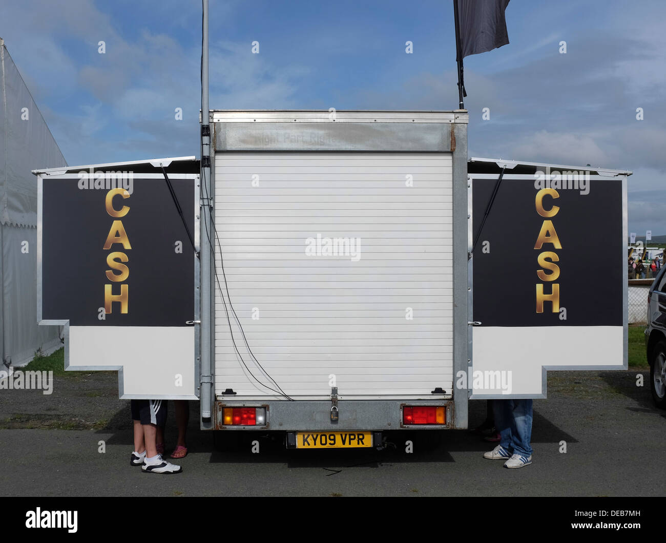 People using a mobile ATM cash point van to withdraw money at Pembrokeshire agricultural show Wales UK Stock Photo