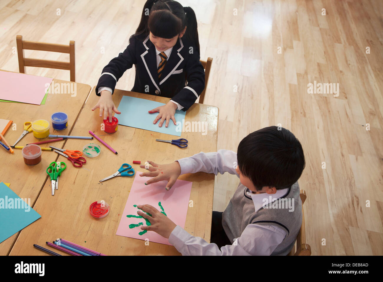 Preschool kids finger painting Stock Vector Images - Alamy