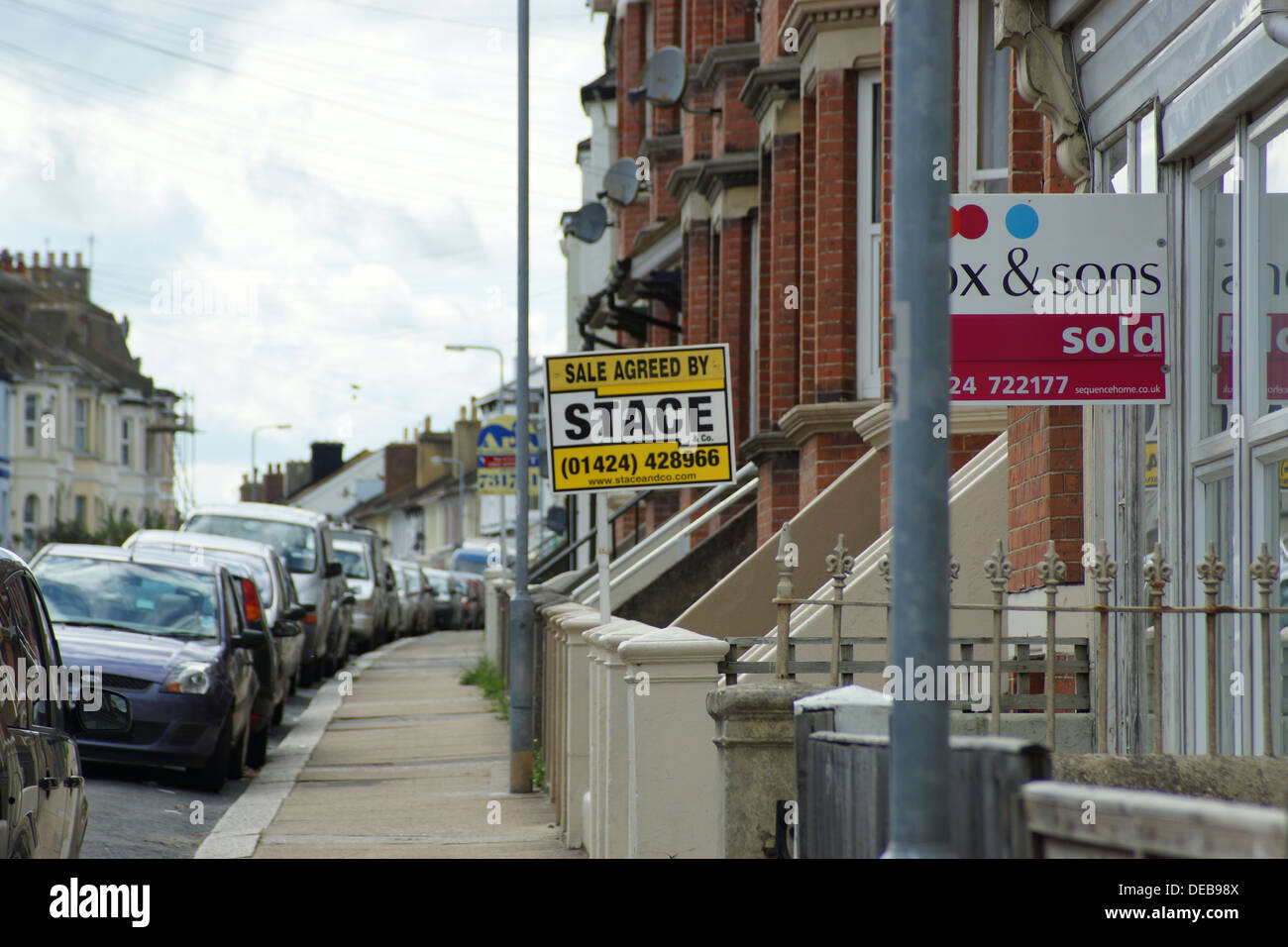 For sale sign street houses sold sold sale agreed Stock Photo Alamy