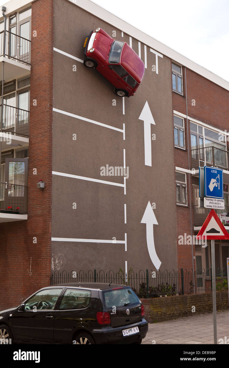 Juxtaposition of two cars in the street in Rotterdam, Holland Stock Photo