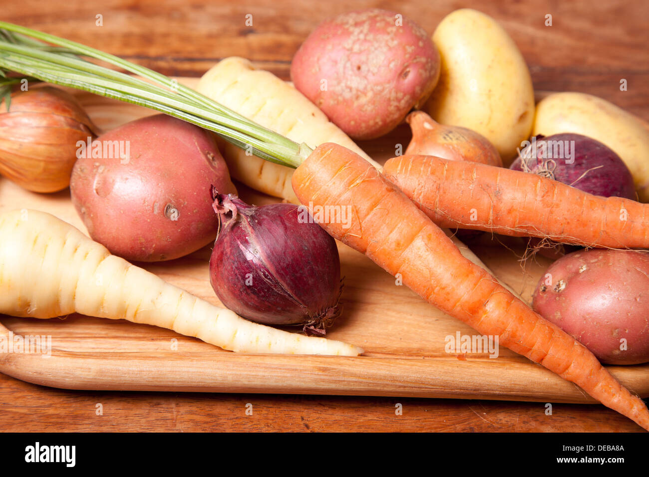 selection of fresh vegetables on the wooden table, close up picture. Stock Photo
