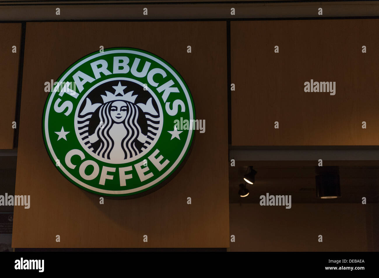 A Starbucks display sign on the wall at the Orlando International