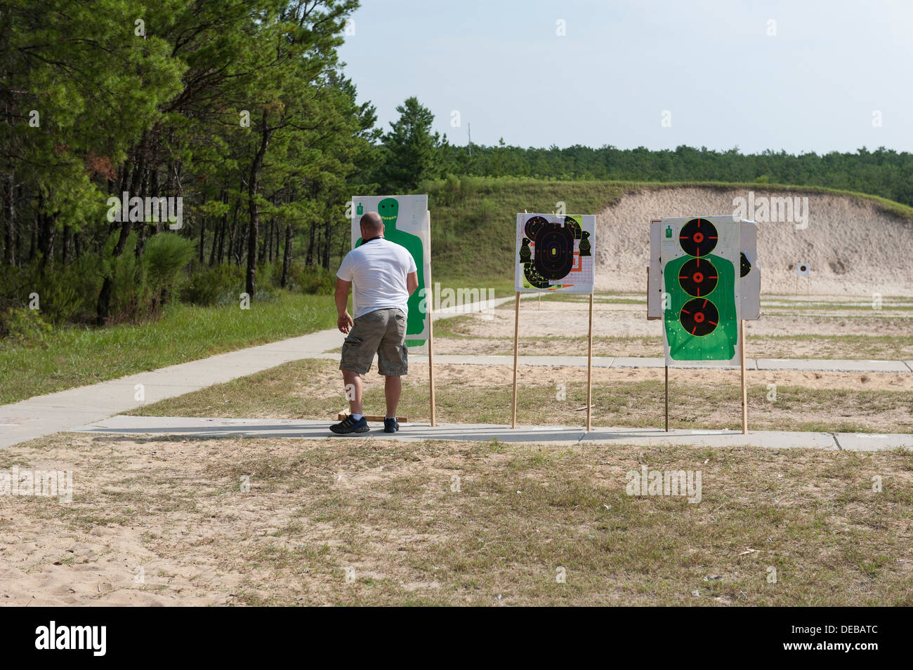 Man checking target at the Ocala National Forest Public Shooting Range on  State Road 40 in Ocala, Florida USA Stock Photo - Alamy