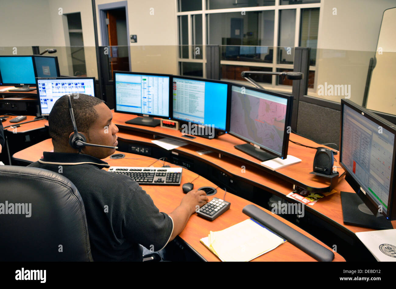 Prince George's County Public Safety Communication dispatcher at the dispatch center in Bowie Maryland Stock Photo