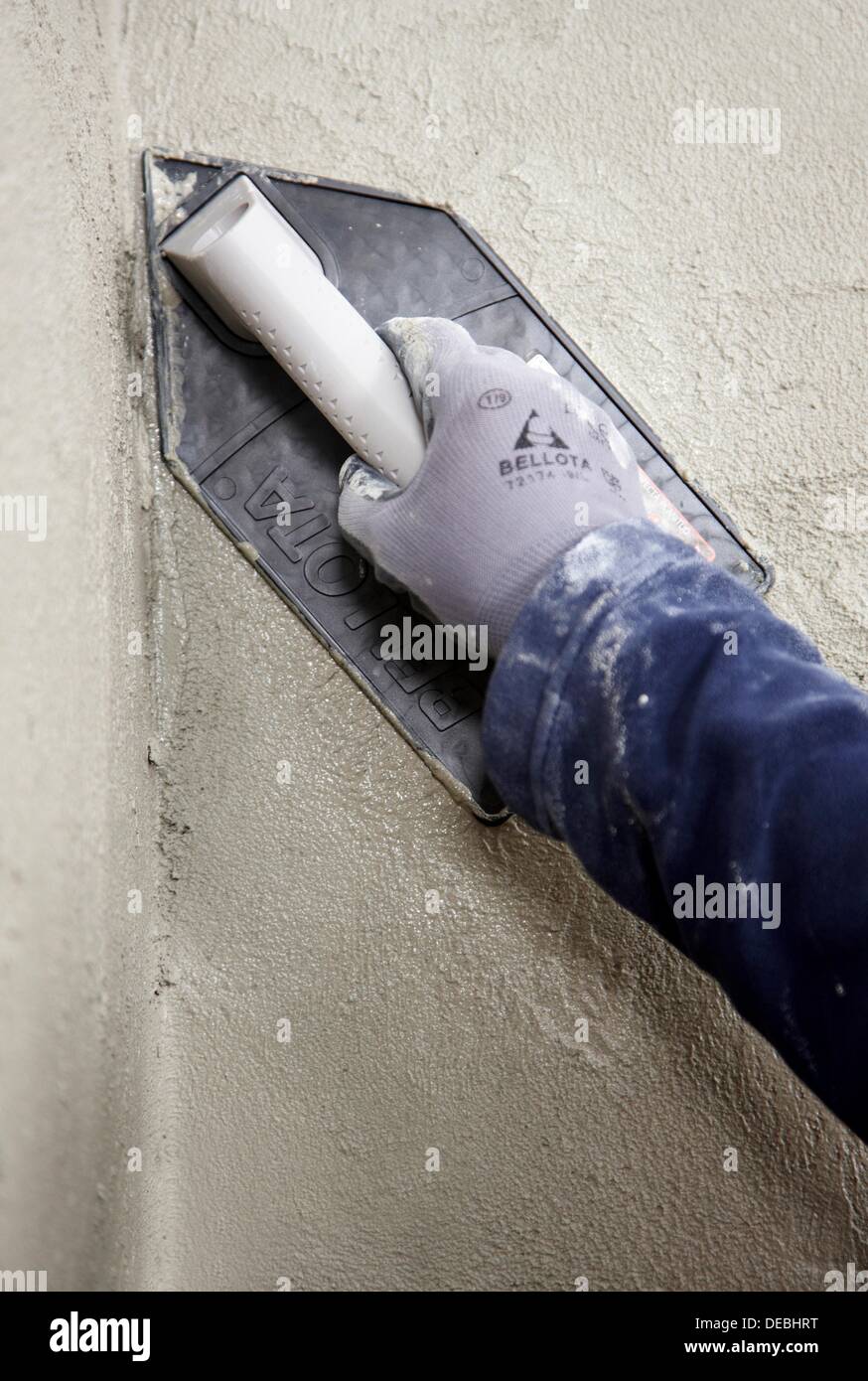 Roughcast, plastering trowel, new homes under construction