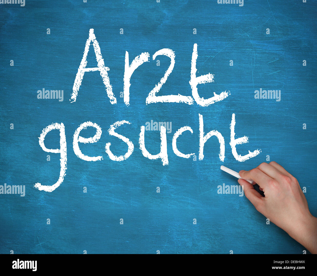 Hand writing arzt gesucht Stock Photo