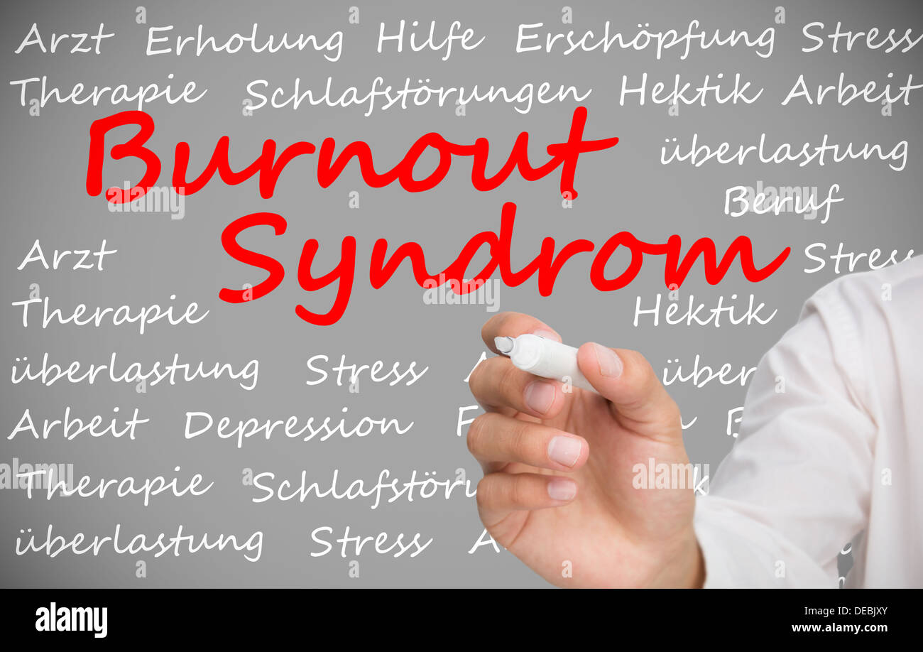 Hand writing german words about burnout syndrome Stock Photo