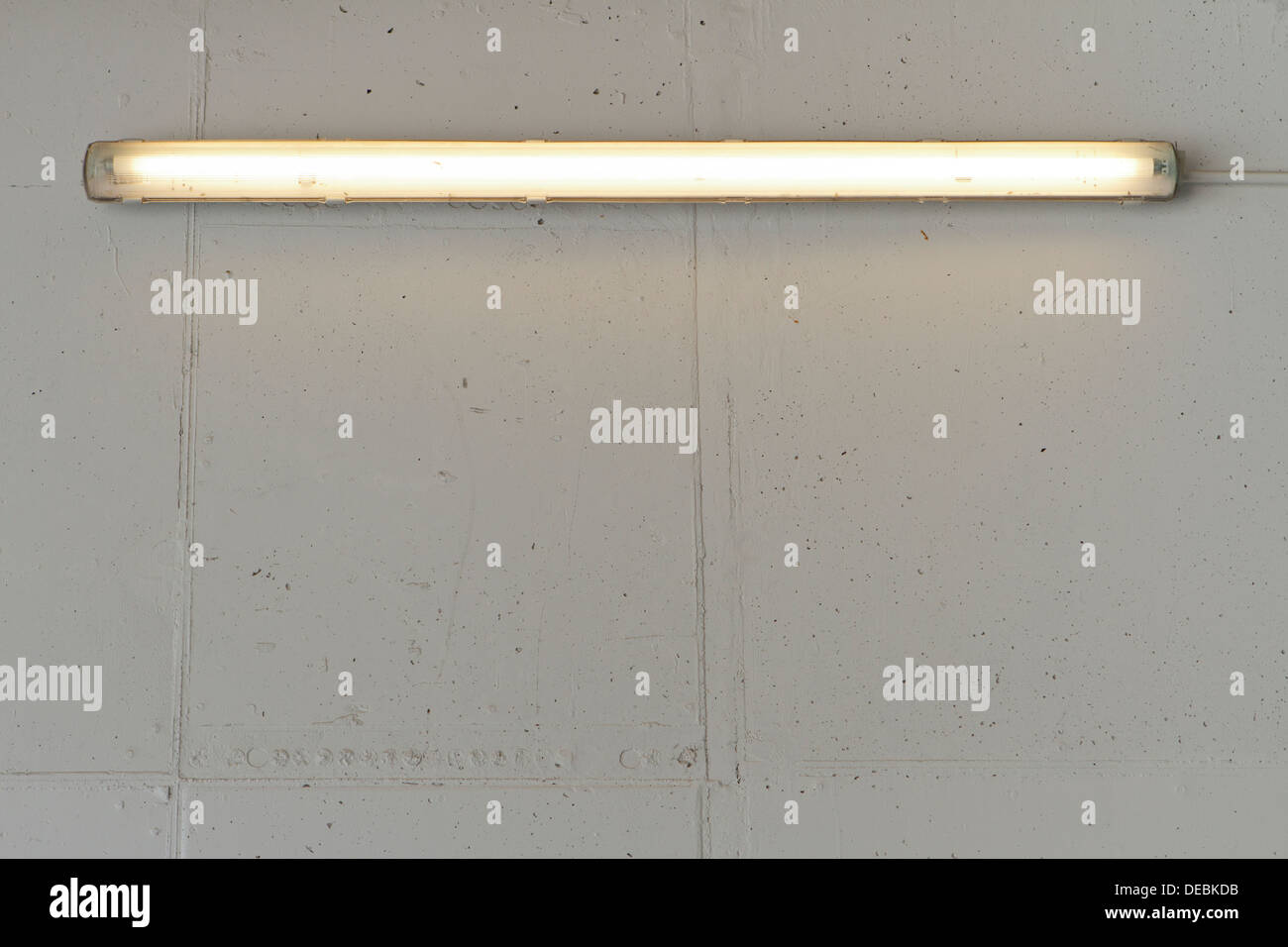 Fluorescent light on concrete wall Stock Photo Alamy