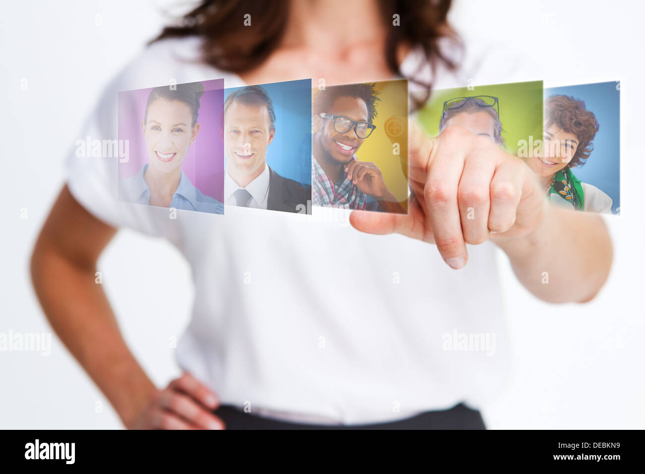 Elegant businesswoman selecting future employees Stock Photo