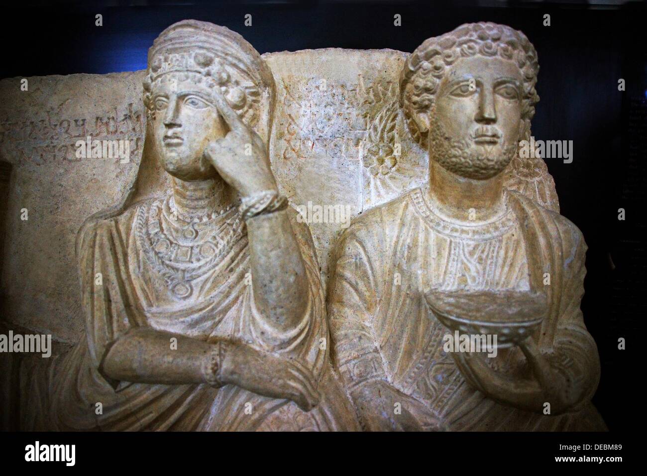 Detail of a funerary relief of a couple during a funeral feast from the Tomb of Taai at Palmyra (2nd century CE), Damascus Stock Photo