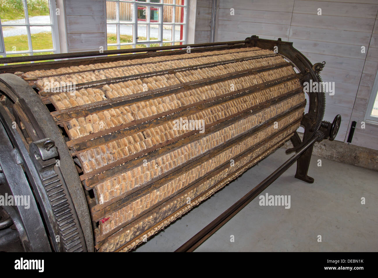MACHINE WITH ROWS OF TEASELS FOR RAISING THE NAP ON WOVEN WOOLLEN Stock