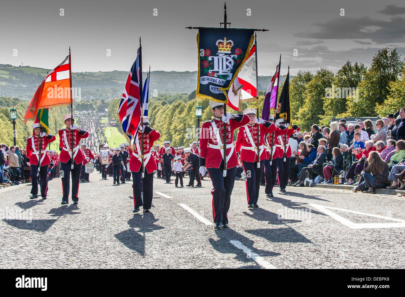 A flute band colour party parading at the Ulster Covenant 100th Anniversary Parade to Stormont Estate, Belfast Stock Photo