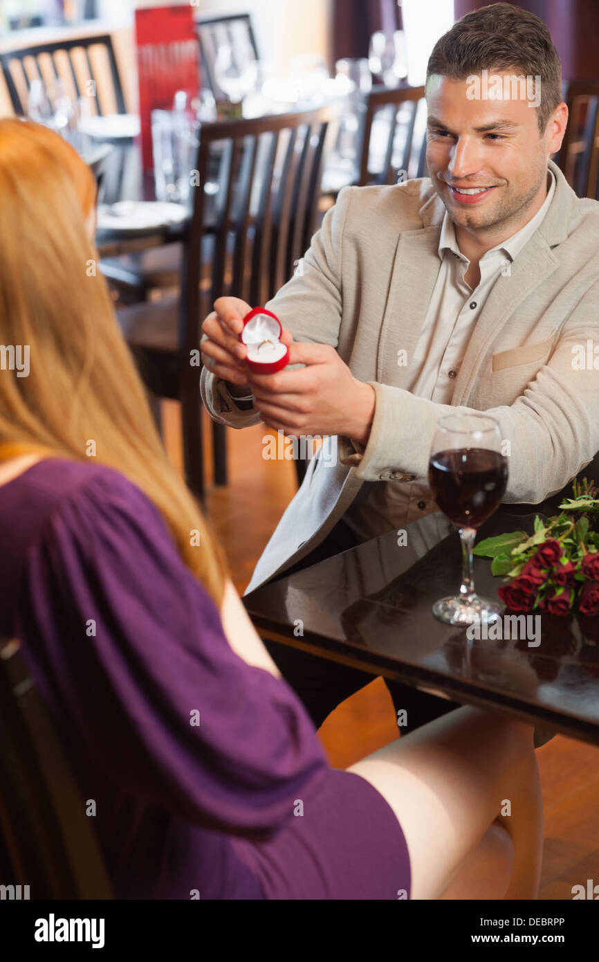 Handsome man making marriage proposal Stock Photo