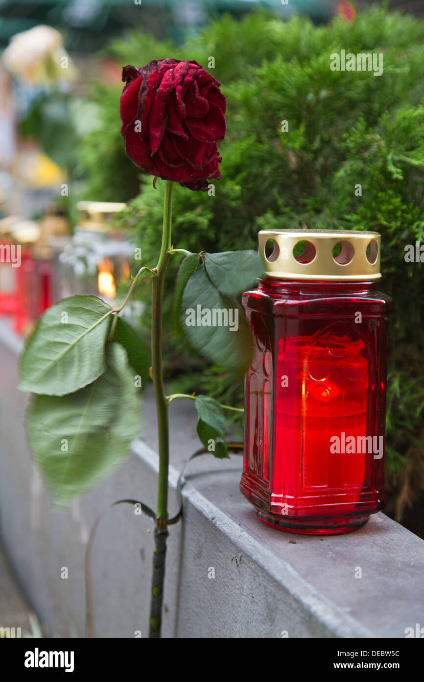 Poznan, Poland, rose candle and grief at the scene of a murder in the pedestrian Stock Photo