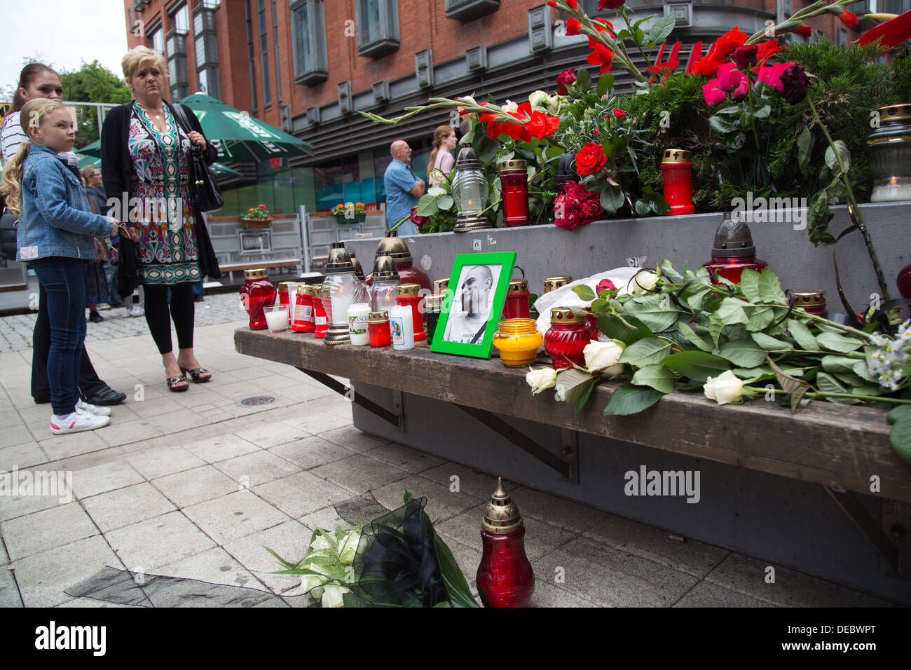 Poznan, Poland, silent tribute at the end of a funeral march at the scene of a murder in the pedestrian Stock Photo