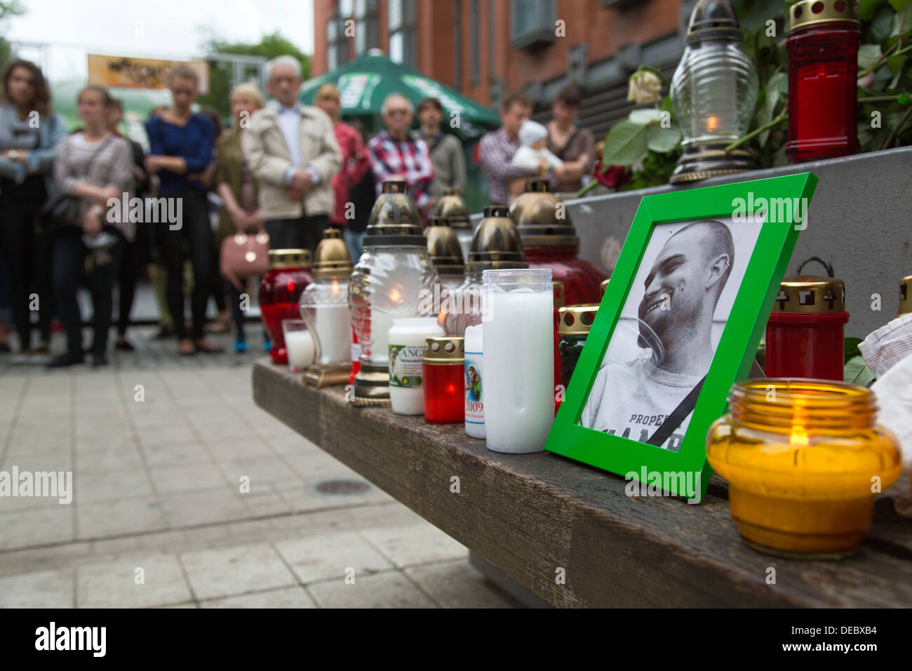 Poznan, Poland, silent tribute at the end of a funeral march at the scene of a murder in the pedestrian Stock Photo
