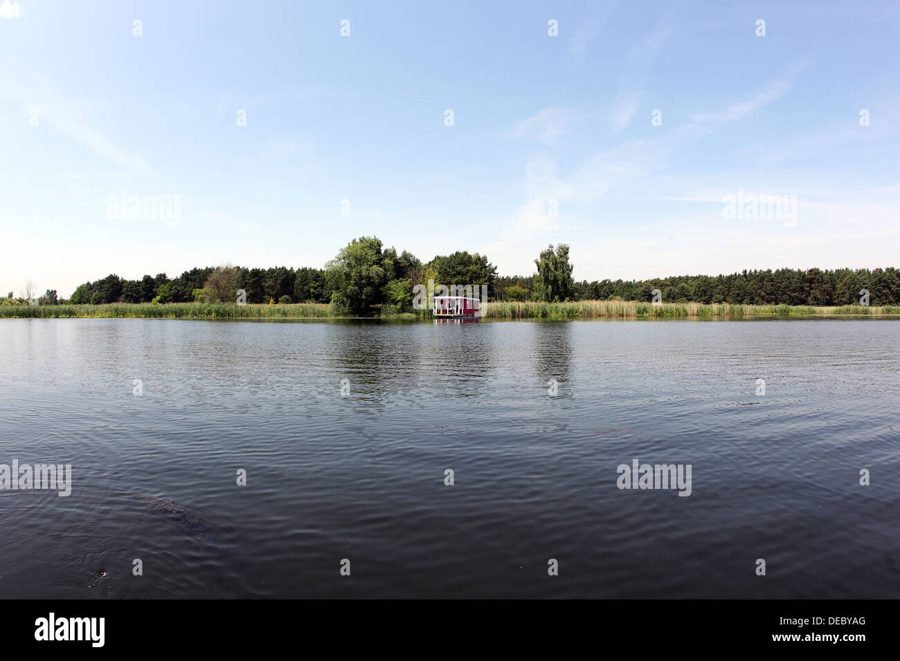 Brandenburg, Germany, a bungalow boat on the river Havel Stock Photo